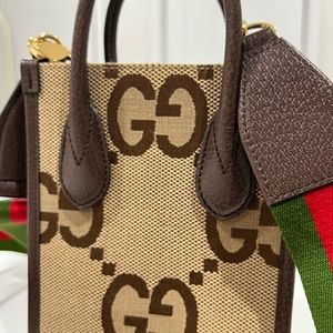 Gucci Jumbo GG Canvas Vertical Mini Tote